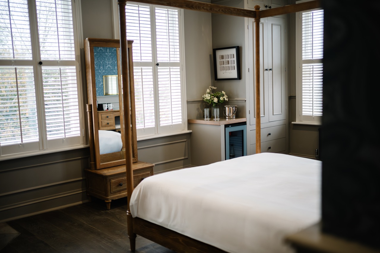 Cotswold suite bedroom with a four poster bed