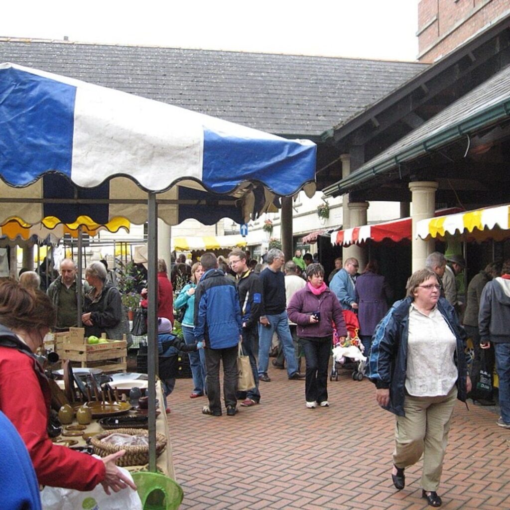 People enjoying the stroud farmers market on a saturday