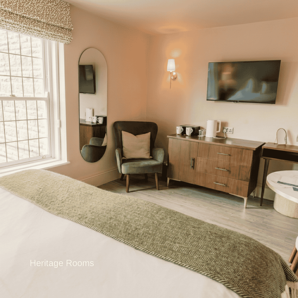 guest comforts with storage and tv in heritage room hatton court hotel